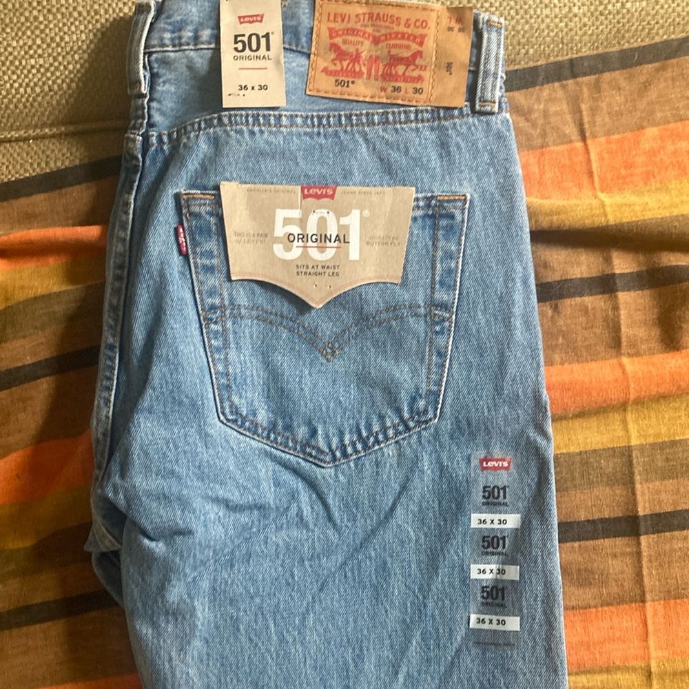 Levi’s original cut 501’s lighter blue, NEW WITH TAGS